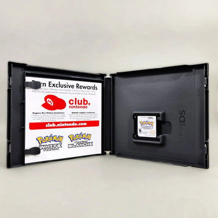 Pokémon White Version for Nintendo DS - CIB contents inside case displaying paper inserts and DS game cartridge, good condition