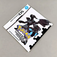 Nintendo DS Pokémon White Version instruction booklet, featuring a white cover with black, blue, and yellow graphics, shown on a neutral gray background.
