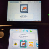 A close-up of a Nintendo 3DS handheld console showing the Pokémon White Version app on the screen, with the Pokémon logo icon highlighted.