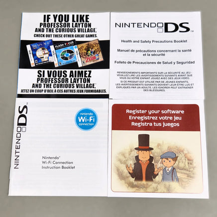 Professor Layton and the Curious Village for Nintendo DS - Front view of included paperwork and pamphlets including a registration card and Nintendo DS Health and Safety booklet along with a DS game advertisement