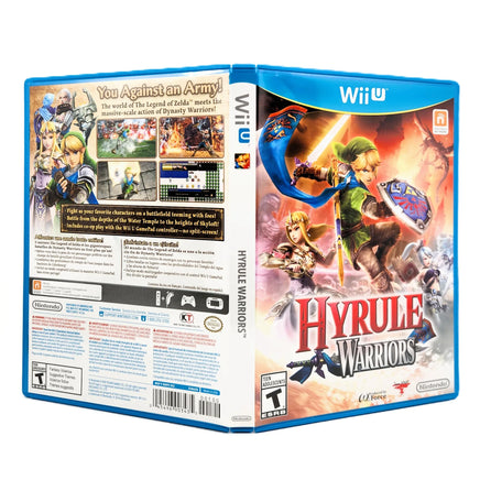 Nintendo Wii U Hyrule Warriors video game case shown from the front and back, featuring colorful fantasy artwork with Link, Princess Zelda, and other characters on a white background.