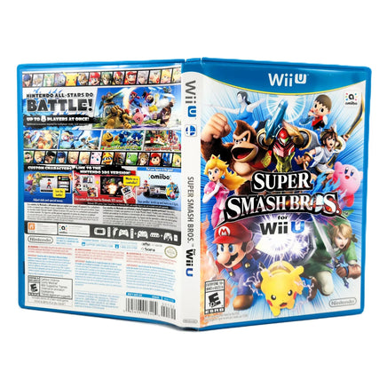 Super Smash Bros. for Wii U video game case shown from the front and back, featuring colorful character artwork on the cover and game information on the back panel, photographed on a white background.