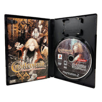 Castlevania Lament of Innocence for PlayStation 2 - Open case view of official game release showing manual and game disc neatly arranged