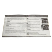 Armored Core PlayStation 1 Good - Open view of instruction manual showing staple binding