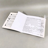 Asteroids for PlayStation 1 - Authentic instruction booklet showing interior center pages displaying the intact registration card, like new condition