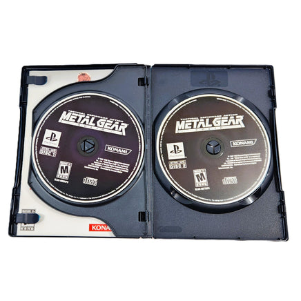Metal Gear Solid Long Box PlayStation 1 Like New CIB - Inside Contents Of Retail Game Box Showing Game Disc 1 and 2