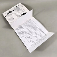Tenchu: Stealth Assassins for PlayStation 1 - Interior view of open instruction manual showing registration card intact, very good condition