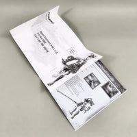Vagrant Story for PlayStation 1 - Open instruction booklet showing center pages with intact registration card and staple binding, like new condition