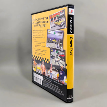 A used PlayStation 2 game case for 'Crazy Taxi' shown from the back and spine, standing upright on a neutral gray background.