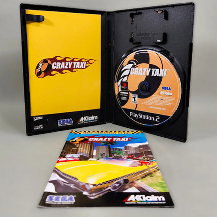 Crazy Taxi [Bonus: Mini-Strategy Guide Enclosed] for PlayStation 2 - Complete in box with disc, manual, and mini-strategy guide shown in open case, like new condition