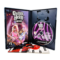 Guitar Hero Encore Rocks The 80'S for PlayStation 2 - View of Open Case Disc & Manual, good condition CIB
