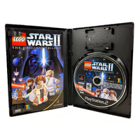 LEGO Star Wars II: The Original Trilogy for PlayStation 2 - Open case displaying contents, good condition