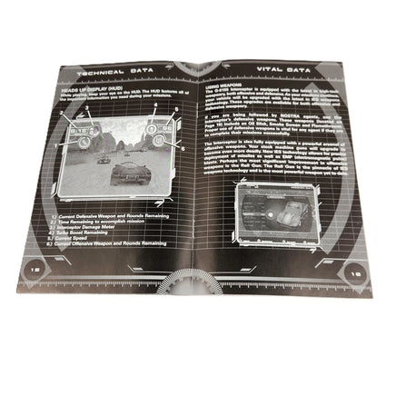 Spy Hunter [Greatest Hits] PlayStation 2 - Official instruction manual open to center with staples shown, very good condition