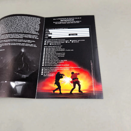 Star Wars Episode III: Revenge of the Sith for PlayStation 2 - Close up view of authentic game registration card still attached to manual, like new condition