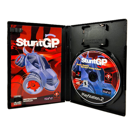 Stunt GP for PlayStation 2 - Interior view with disc & inserts, like new condition
