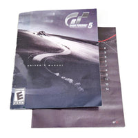Gran Turismo 5 PlayStation 3 Acceptable CIB - View of instruction manual detached from booklet staple binding