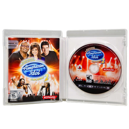 Karaoke Revolution American Idol Encore 2 PlayStation 3 Very Good - CIB View Of Open Case With Disc Properly Seated
