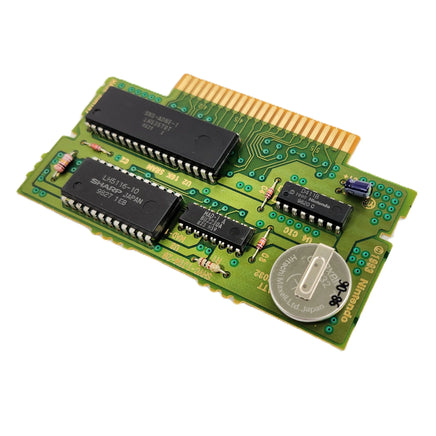 Donkey Kong Country 2 Players Choice Super Nintendo Very Good - Close up view of authentic game circuit board showing pins and save battery