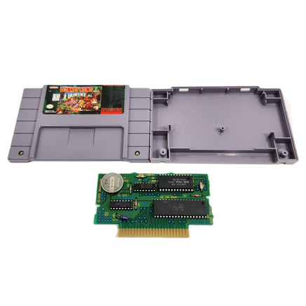 Donkey Kong Country Super Nintendo Very Good - Game cart open showing circuit board