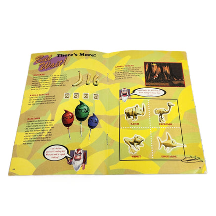 Donkey Kong Country Super Nintendo Very Good - View of official game instruction manual showing staple binding