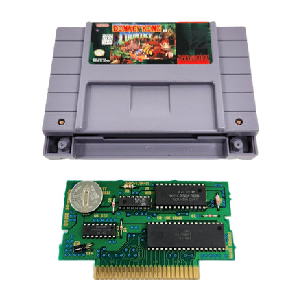 Donkey Kong Country Super Nintendo Very Good Loose - SNES Cartridge shell with view of authentic game circuit board with working save battery installed
