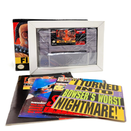 Final Fight Super Nintendo Very Good CIB- Genuine Retail shown behind the game cart in baggie along with manual and inserts