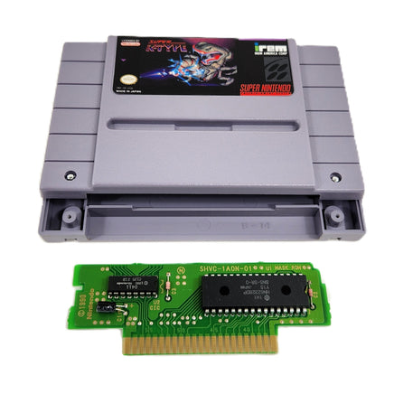 Super R-Type Super Nintendo Very Good Loose - View of cartridge shell opened and displaying authentic game circuit board