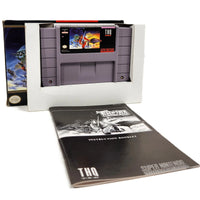 Battle Clash Super Nintendo Brand New - View of official game cart inside inner cardboard tray with instruction manual