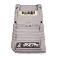 Nintendo Game Boy Console System Bundle with Tetris, & Light Magnifier, Very Good Loose - Rear view of system showing battery door and serial number