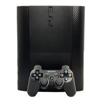 PlayStation 3 Super Slim 250GB Console System Bundle Black Carbon Fiber Skin Very Good Loose - View 1 Top of console Standing On End with Control Pad In Front