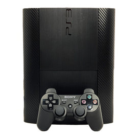 PlayStation 3 Super Slim 250GB Console System Bundle Black Carbon Fiber Skin Very Good Loose - View 1 Top of console Standing On End with Control Pad In Front