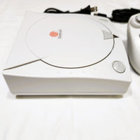 White Sega Dreamcast System on a white background