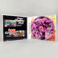 Dynamite Cop - Sega Dreamcast - Open case view with front insert and tray artwork visible, like new condition