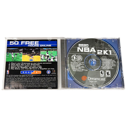 Sega Dreamcast NBA 2K1 game disc and manual on a white background