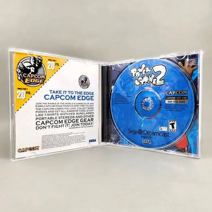 Power Stone 2 - Dreamcast - Interior view showing disc & instruction manual, like new condition