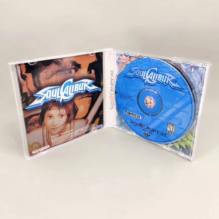 SoulCalibur - Dreamcast - Disc resting in tray with manual displayed, like new condition